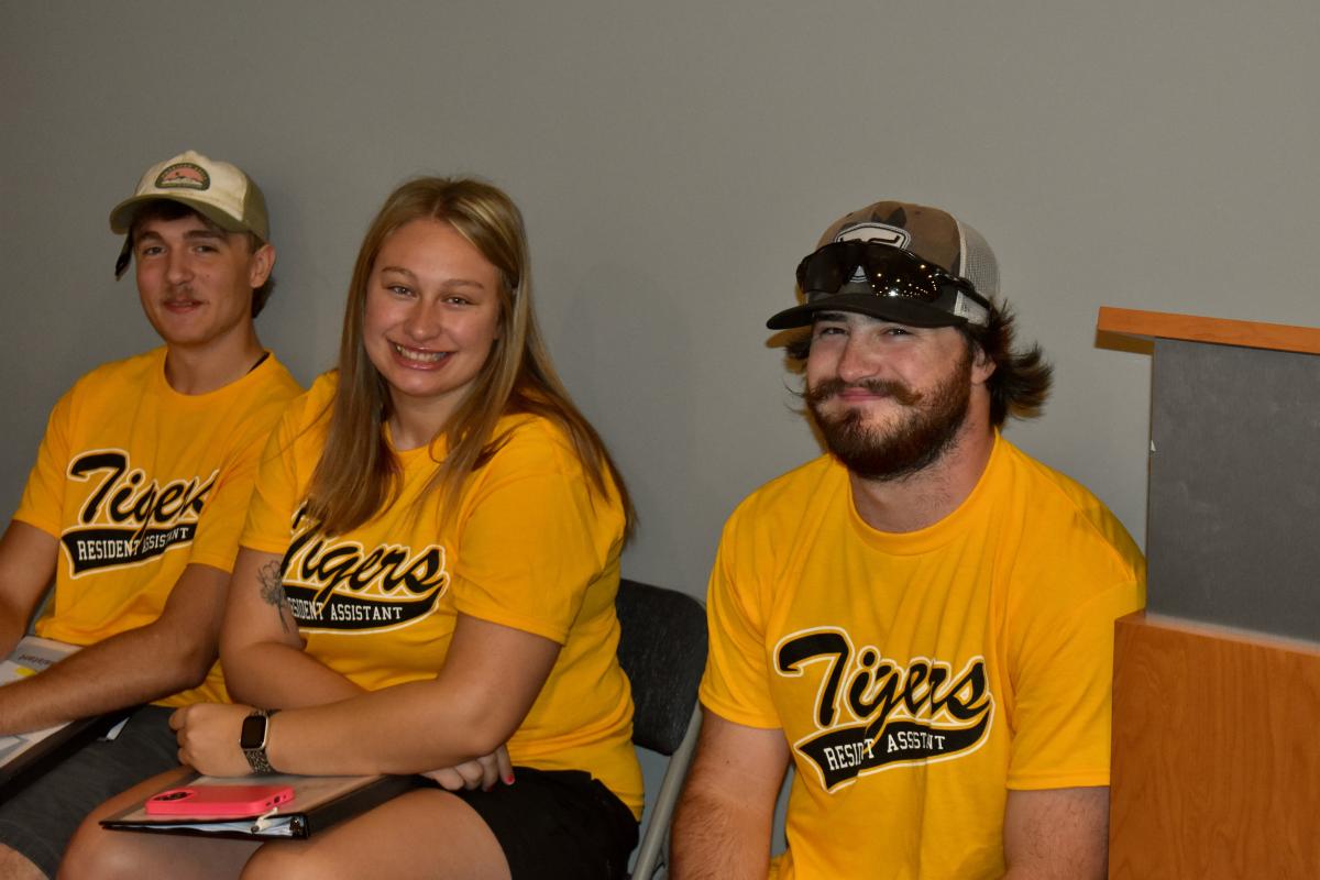 Students sitting in chairs.